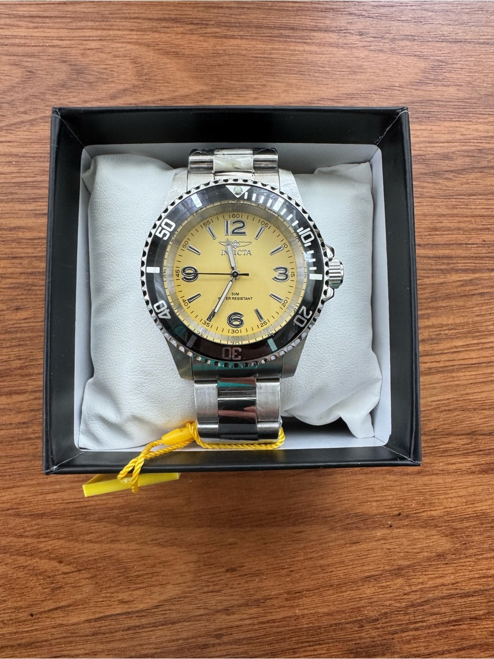 Invicta Silver Watch with Yellow Dial and Black Bezel